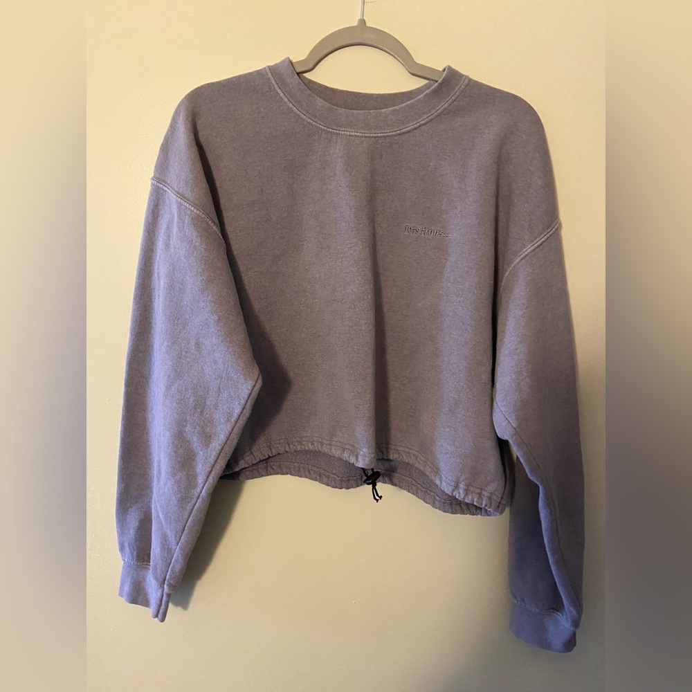 It’s Frans cropped sweater with drawstring waist